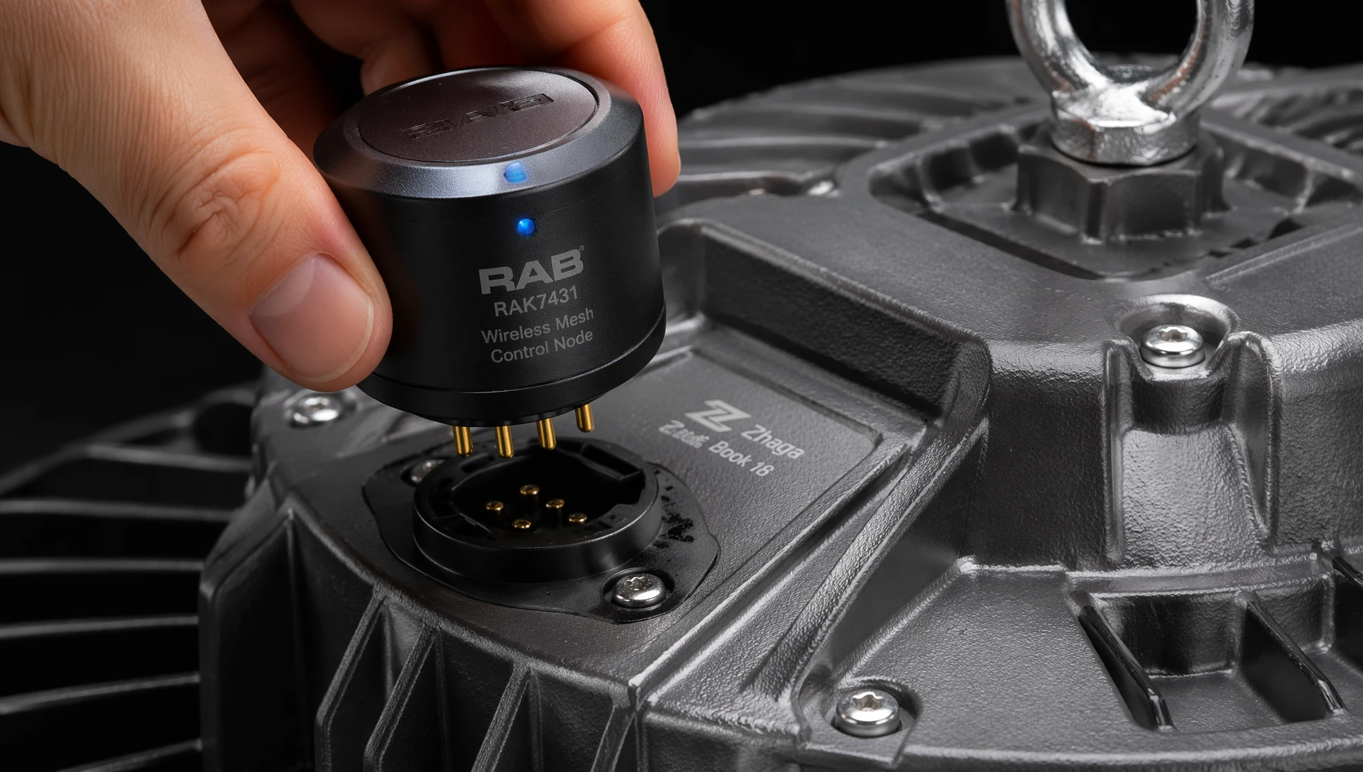 Industrial high-bay LED fixture integrated with an NLC certified smart wireless control node via a Zhaga Book 18 socket